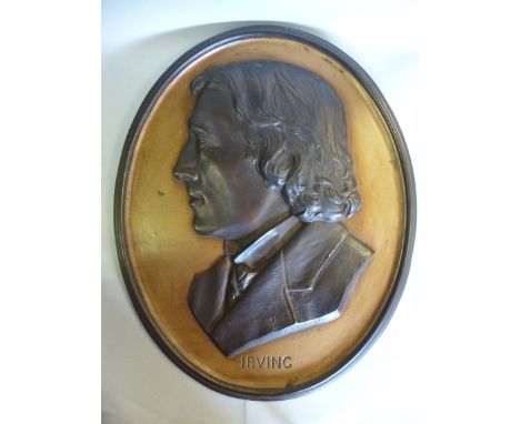 After AEL Roost - a late Victorian bronze finished, cast iron oval portrait plaque, featuring a profile study of Irving  bear