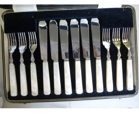 A set of six 1930s Firth stainless steel fish knives and forks, on mother-of-pearl handles, in a fitted, fabric lined case