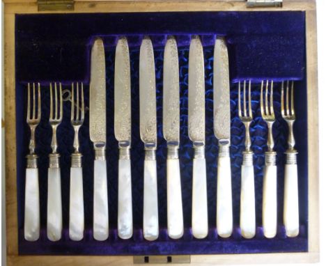 An Edwardian set of six engraved silver plated dessert knives and forks on silver ferrules (Sheffield 1902) on mother-of-pear