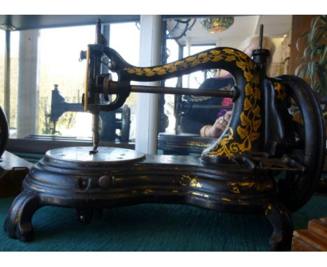 'The Jones Hand' manual sewing machine, manufactured by Jones & Co, circa 1880, displaying the Jones Hand Machine insignia, d