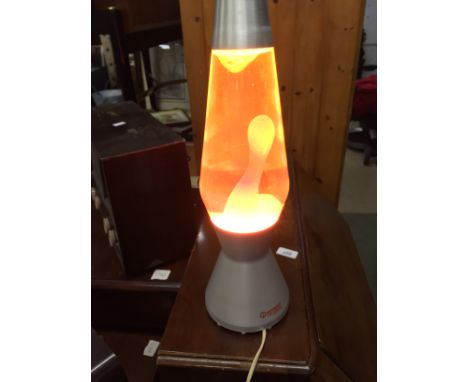 An orange Mathmos lava lamp.