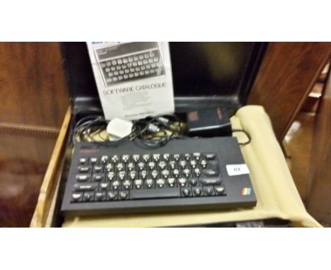 A Sinclair ZX Spectrum in box with manual.