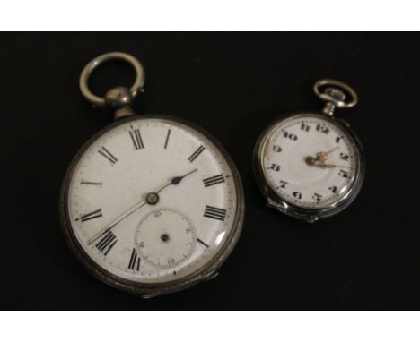 A SILVER OPEN FACED MANUAL WIND POCKET WATCH (NO SECONDS HAND) TOGETHER WITH A SMALL SILVER NIELLO EXAMPLE (MINUTE HAND DETAC