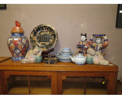 TWO MODERN CHINESE/ ORIENTAL HAND PAINTED FIGURES HOLDING BOWLS WITH ORANGE BACK STAMPS TALLEST HEIGHT -33CM, A LARGE MODERN 