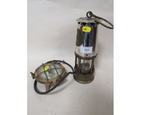 A VINTAGE MINER'S LAMP AND A SHIP'S LAMP
