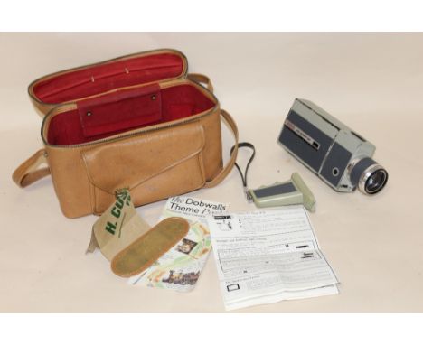 A EUMIG EUMIGETTE ZOOM SUPER 8 MOVIE CAMERA IN CASE, SOME DAMAGE INCLUDING SCUFFS TO PAINT WORK