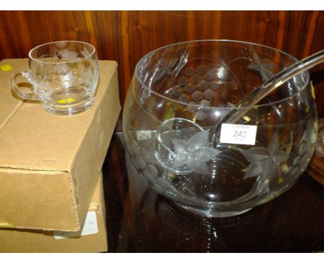 A GLASS PUNCH BOWL, LADLE AND GLASSES SET