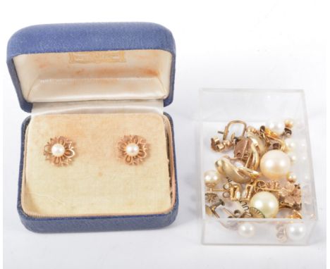 A pair of 9 carat yellow gold stud earrings set with a cultured pearl and other pearl and opal earrings. 