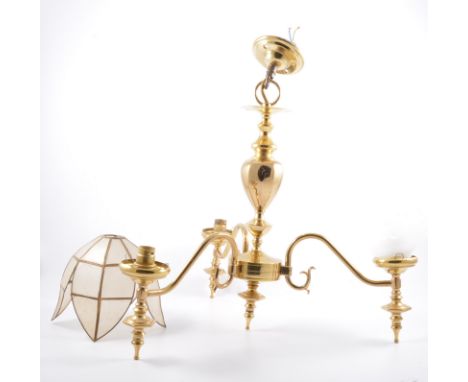 Pair of modern brass two-light ceiling fitments, labelled Christopher Wray, London; modern three-light chandelier; another th