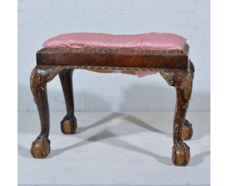 Georgian style walnut carved and painted stool, rectangular top, shell capped cabriole legs with ball and claw feet, 66cm x 4