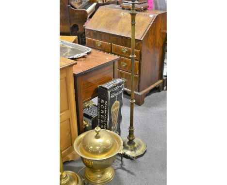 Cast and pierced brass fan fire guard, cast brass trivet with turned ebonised handle, urn shaped coal scuttle with domed cove