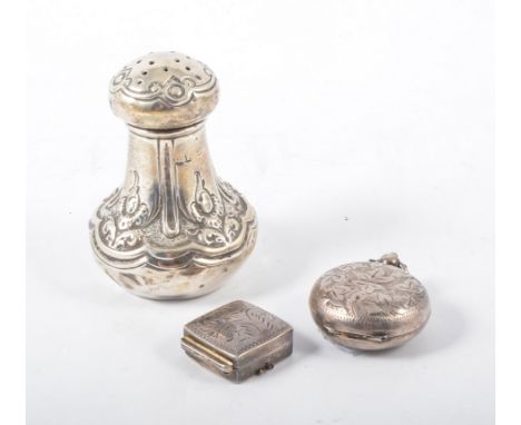 White metal cushion form pill box; engine turned cover, stamped 925, silver sovereign case; TH, Birmingham, 1909, and a silve