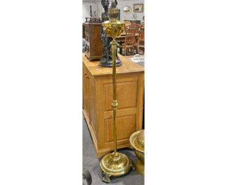 Edwardian brass adjustable standard lamp, opaque glass shade, converted to electricity, currently 151cm.