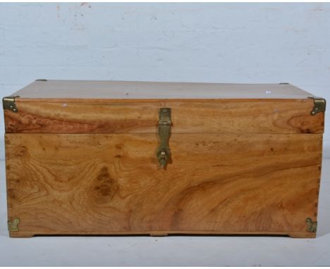 Contemporary teak and brass bound trunk, with brass lock plate, W92cm x D52cm x H42cm. 