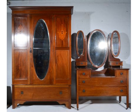 Edwardian inlaid mahogany wardrobe, moulded cornice, plain frieze, oval mirrored door, draw base, bracket feet, width 128cm, 