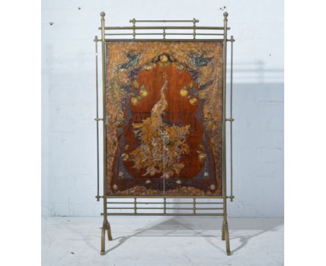 Victorian Aesthetic style brass-framed fire screen, carved and stained wood panel, with peacock design in gesso work,  width 