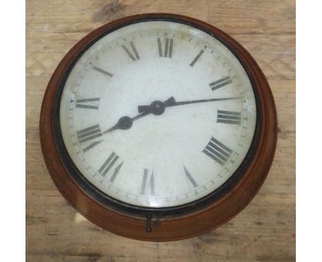 An oak round electric wall clock, diameter 38cm.