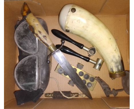 A mixed lot including a hoof handled hunting knife, a pair of goggles, a cow horn shot powder flask etc. 