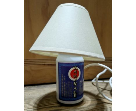 An original prop from the Peter Kay series 'Phoenix Nights', Kamikaze can table lamp, used in the filming of series 2 episode