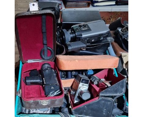 Two boxes of assorted cine camera, video cameras &amp; accesoories etc. to include a Bell &amp; Howell, Ferguson Videostar, B