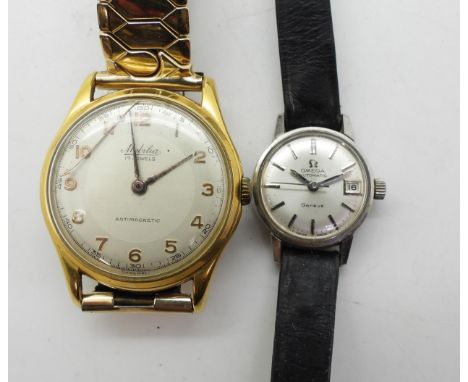A ladies Omega automatic Geneve, with Seamaster logo back, together with a vintage Mobilia vintage watch Condition Report:No 