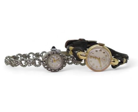 A 9ct gold ladies Tudor watch, hallmarked Chester 1951 inner case stamped R.W.Co Ltd, with generic leather strap, together wi