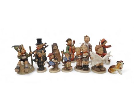 A collection of Hummel figures including Carnival, Max and Moritz, Latest News, Skiier, Mountaineer and others Condition Repo