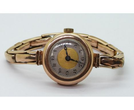 A 9ct gold ladies vintage Swiss watch, weight including mechanism 17.2gms Condition Report:Available upon request