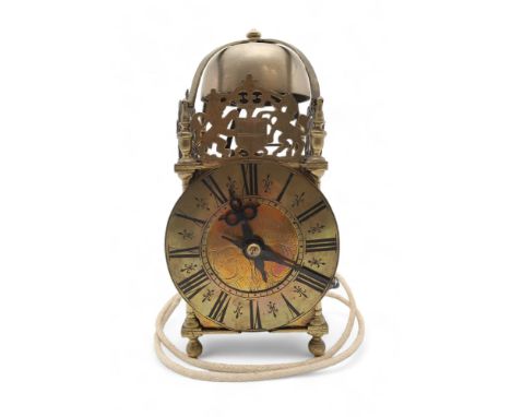 An 18th century and later brass lantern clock the dial signed Richard Rayment of St Edmunds Bury, the pillared case with ball