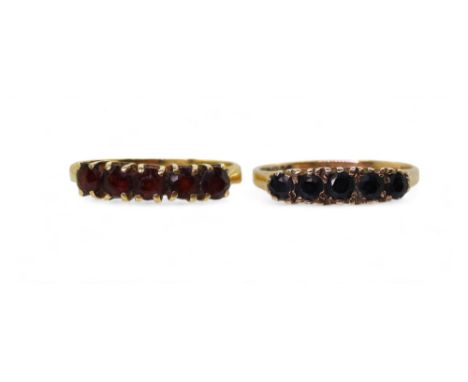 An 18ct gold garnet ring, size N, weight 2gms, together with a 9ct sapphire ring with scroll mount, size N1/2, weight 1.7gms 