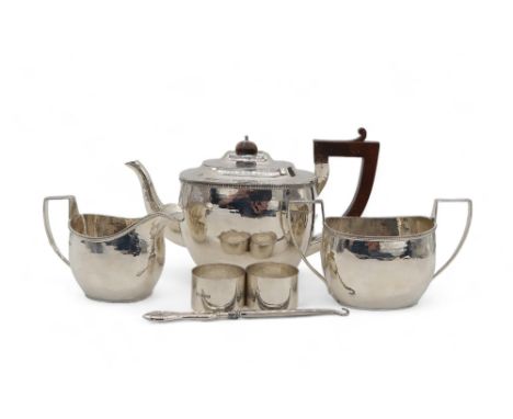 A George V three piece silver tea service, by S Blanckensee &amp; Son Ltd, Birmingham 1926, the bodies with a hammered finish
