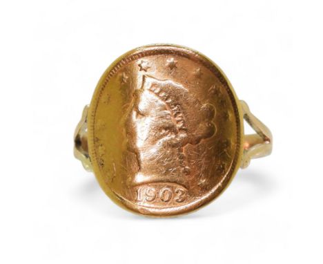 A 1903 United States of America 2 1/2 Dollar coin with soldered on 14k gold ring shank, finger size S1/2, weight 5.1gms Condi