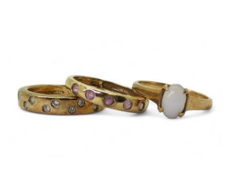 Three 9ct gold rings, opal, size J1/2, diamond set band ring, size J1/2, a 9ct gold pink gem set band ring, size I1/2, weight