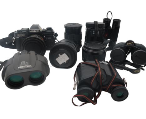 A pair of Leitz, Wetzlar Trinovid 10x22 C binoculars; together with four further pairs with manufacturers to include Nikon an