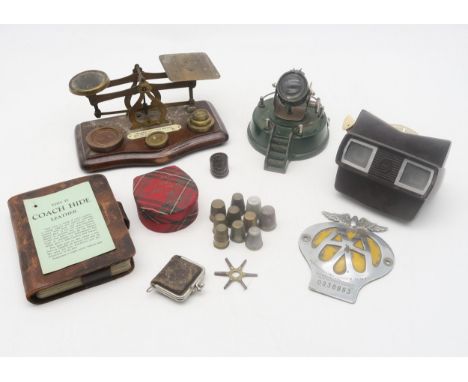 A green painted miniature searchlight, vintage AA grille badge, postal scales etc.Condition Report:Available upon request
