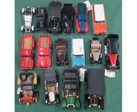 A collection of diecast model vintage cars and trucks by the Franklin and Danbury Mints, to include a 1931 Ford model A, 1935