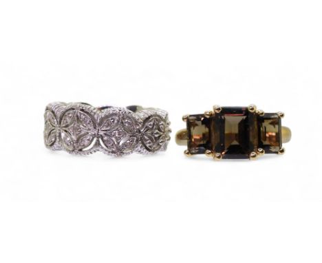 A 9ct white gold ring set with diamond accents with an estimated approx total of 0.10cts, size K1/2, together with a 9ct smok