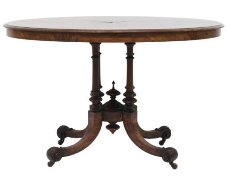 A VICTORIAN WALNUT OVAL&nbsp; CENTRE TABLE&nbsp; oval top with quarter match veneer with boxwood and ebony inlays on cluster 