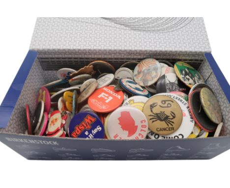 A large collection of vintage pin badges, to include an example from John Byrne's June 1975 exhibition at the Third Eye Centr