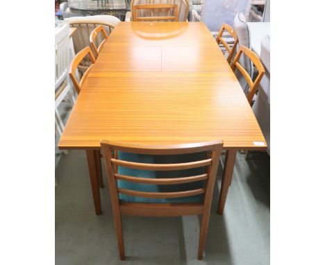 A mid 20th century teak Beithcraft extending dining table and six chairs, dining table with square tapering supports, 74cm hi
