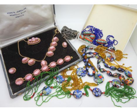 Three millefiori necklaces together with a further example in need of some TLC, and a boxed set of Egyptian vintage costume j