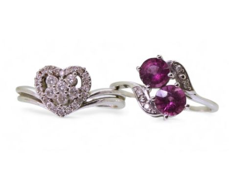 A 9ct gold diamond cluster ring in the shape of a heart, set with estimated approx 0.30cts of brilliant cut diamonds, size N1