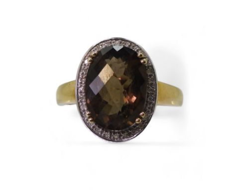 A 9ct gold checker board cut smokey quartz and diamond accent ring, size S1/2, weight 4.4gms Condition Report:Available upon 