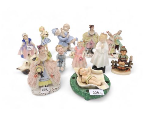 A group of figures including Dresden, Goebel, Royal Doulton, Royal Worcester etc Condition Report:Available upon request