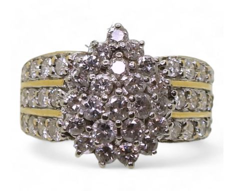 An 18ct gold pear shaped diamond cluster ring, set with estimated approx 1.40cts, finger  size N1/2, weight 7.9gms Condition 