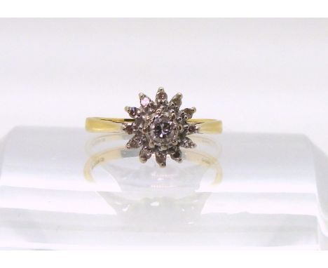An 18ct gold diamond cluster ring set with estimated approx 0.20cts of brilliant and eight cut diamonds, finger size M1/2, we
