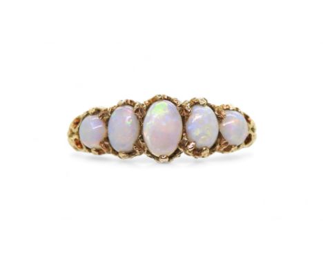A 9ct gold five opal ring, with scrolled mount, finger size O1/2, weight 3.2gms Condition Report:Available upon request