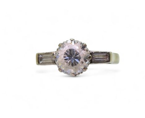 A yellow metal and platinum cz three clear gem stone ring, size L1/2, weight 3.7gms Condition Report:All the stones are cz, t