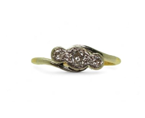 An 18ct gold and platinum three stone diamond ring set with estimated approx 0.15cts of brilliant cut diamonds, size M, weigh