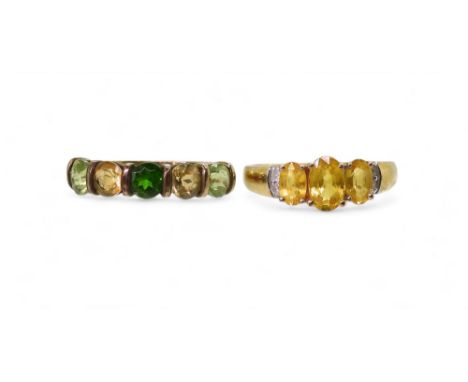 A 9ct yellow sapphire and diamond accent ring, size I1/2, together with a green and yellow gemstone ring, mounted in 9ct , si
